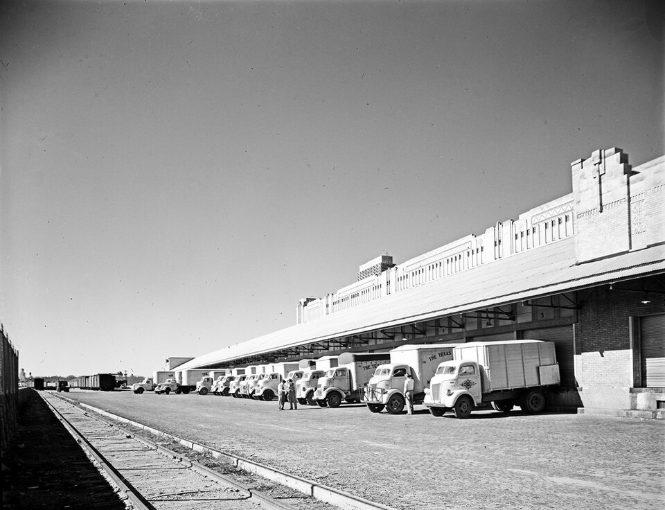 Container yard with trucks staged for pickup